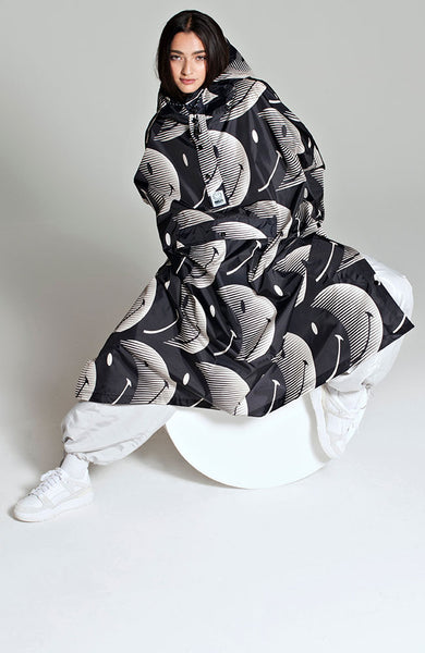 Rainkiss half moon smiley rain poncho made of recycled PET unisex
