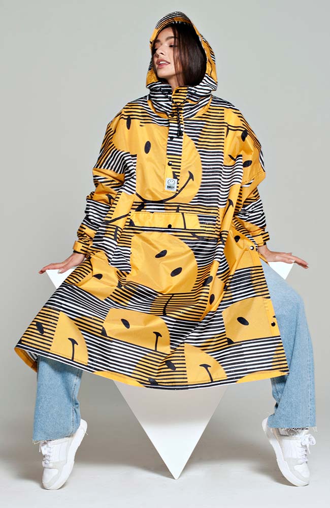 Rainkiss unisex sunset smiley rain poncho made from sustainable recycled PET | Sophie Stone