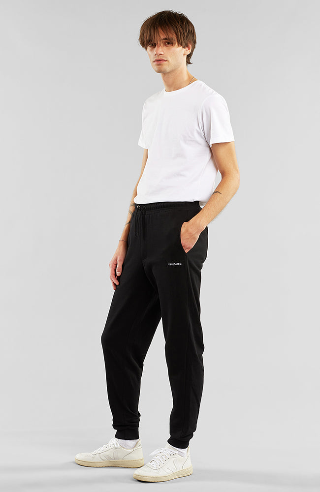Dedicated Sweatpants lund logo black from organic cotton | Sophie Stone
