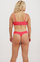 Organic Basics Naked rib thong strawberry from recycled nylon ladies | Sophie Stone