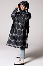 Rainkiss Black polka dot rain poncho made from recycled PET | Sophie Stone