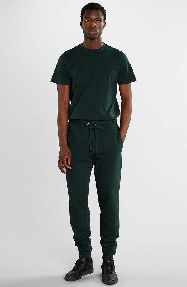 Dedicated Sweatpants lund logo dark green from organic cotton | Sophie Stone