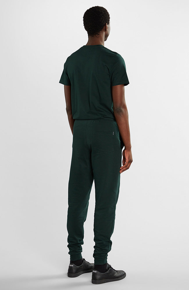 Dedicated Sweatpants lund logo dark green from sustainable organic cotton | Sophie Stone