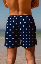 Arlo swimming trunks in dark blue with white dots | Sophie Stone 